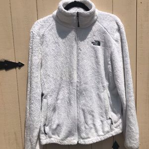 White fuzzy north face jacket